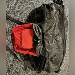 Black and Red portable expanding duffel travel bag
